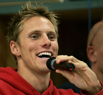 South Africa swimmer Roland Schoeman laughs during a news conference at the Pan Pacific Swimming Championships in Victoria, Canada, August 16, 2006. The Pan Pacific championships will begin August 17. 