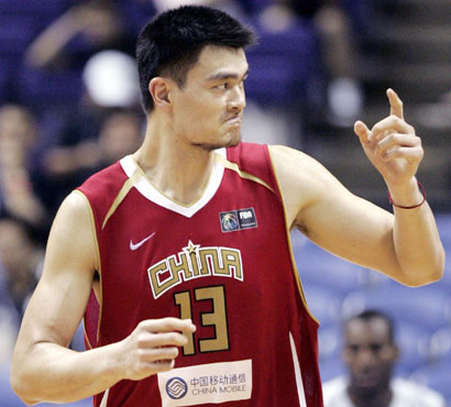 China's Yao Ming celebrates their 100-83 win against Senegal during the first round of the world basketball championships in Sapporo August 23, 2006. China could advance to the next round if they beat Slovenia in the next match. [Reuters]