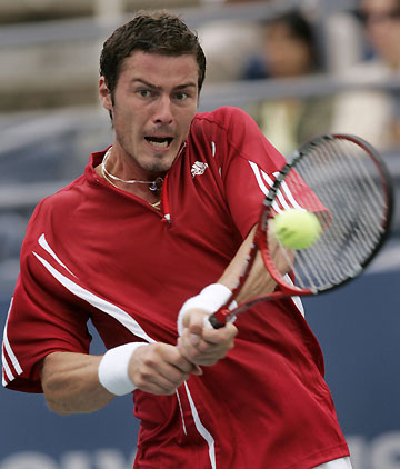 Russia's Marat Safin plays a shot to Czech Republic's Robin Vik during their match at the U.S. Open tennis tournament in New York, August 30, 2006. 