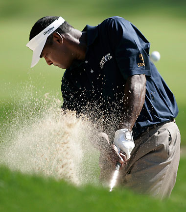Vijay Singh of Fiji hits out of a bunker on the seventh hole during the final round of the 2006 Deutsche Bank Championship golf tournament in Norton, Massachusetts, September 4, 2006. 