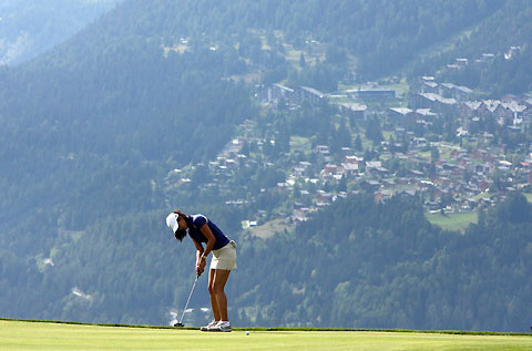 Michelle Wie of the U.S. putts on the seventh hole during the first round of the European Masters golf tournament in Crans-Montana, Switzerland, September 7, 2006. 