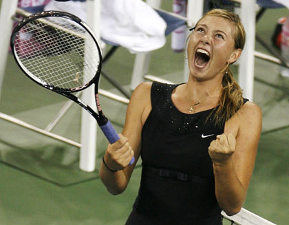 Justine Henin-Hardenne of Belgium(L) defeated Maria Sharpova of Russia(R)  7-5, 6-2 in the finals of the Dubai Tennis Championships in Dubai, United  Arab Emirates on February 25, 2006. Justine won US$ 159,000.00