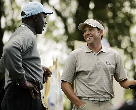 European Ryder Cup player Sergio Garcia of Spain (R) chats with former U.S. basketball star Michael Jordan during their fourball golf match at the Ryder Cup tournament at The K Club in County Kildare, Ireland, September 22, 2006.