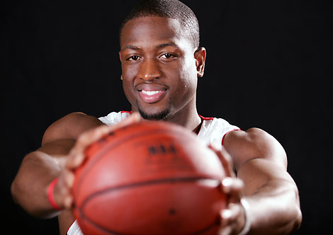 Miami Heat guard Dwyane Wade poses for pictures on media day in Miami, Florida October 2, 2006. 