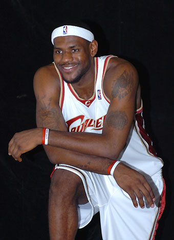 Miami Heat guard Dwyane Wade poses for pictures on media day in Miami, Florida October 2, 2006. 