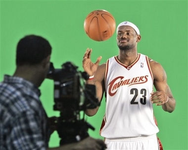 Cleveland Cavaliers' LeBron James tapes a television promotion during the team's media day Monday, Oct. 2, 2006, in Cleveland. After going their separate ways for a few months, the Cleveland Cavaliers are back together as they open a training camp for a season they hope ends with an NBA title. (AP