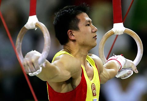 China's Chen Yibing competes in the ring during the men's team final at the 39th Artistic Gymnastics World Championships in Aarhus, Denmark, October 17, 2006. Team China won the gold medal followed by Russian silver and Japanese bronze.