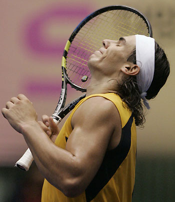 Spain's Rafael Nadal reacts during an exhibition match with Switzerland's Roger Federer in Seoul November 21, 2006. 
