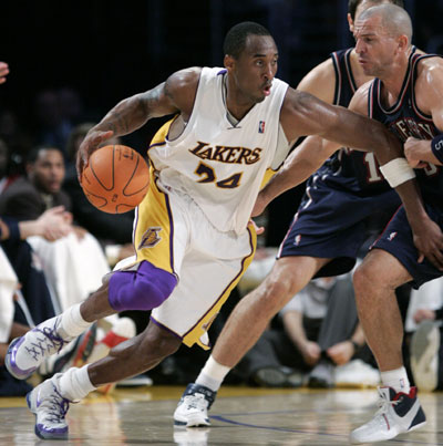 Odom, Kobe lead Lakers over Nets 99-93