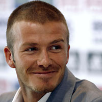 David Beckham smiles during his news conference at the club's grounds in Valdebebas, outside Madrid, June 14, 2007.
