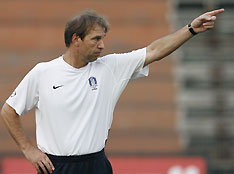 South Korea's head coach Pim Verbeek from the Netherlands directs his players during a training session in preparation for the 2007 AFC Asian Cup soccer tournament in Jakarta July 12, 2007. 