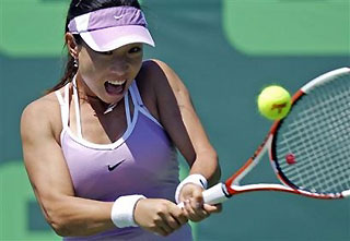 Zheng Jie moves on at Nasdaq-100