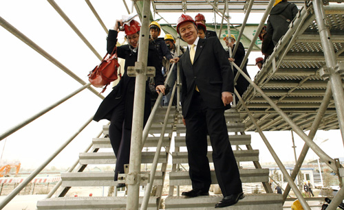London's Mayor visits the building site of Beijing Olympics village