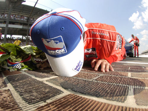 Sam kisses bricks to celebrate his win