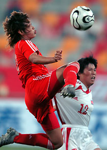 Ma's goal save China from loss