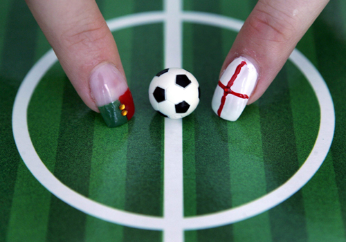 Nails painted with national flags