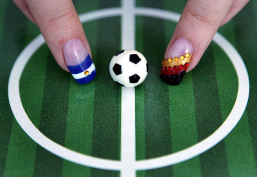 Nails painted with national flags