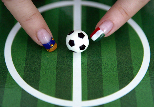 Nails painted with national flags