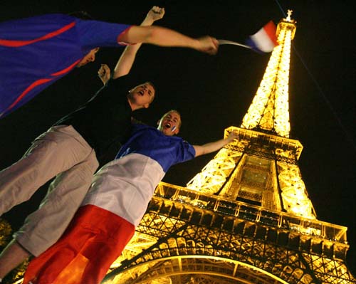 French soccer fans celebrates after team's win