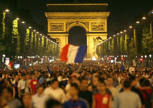 French soccer fans celebrates after team's win