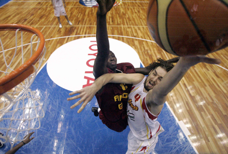 Spain downs Angola 93-83