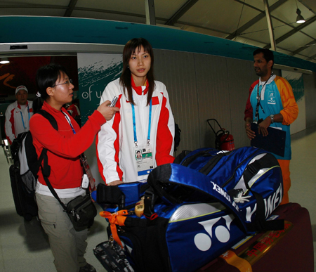 Badminton and gymnastics team arrive in Doha