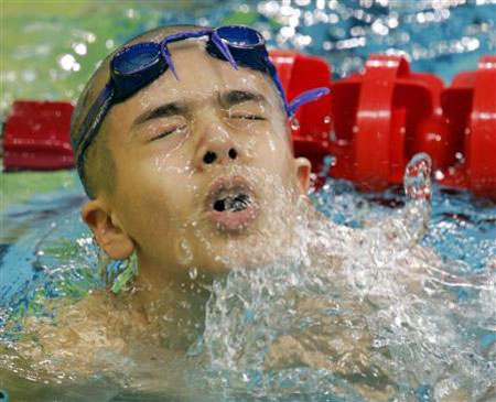 10-year-old swimming boy in Doha
