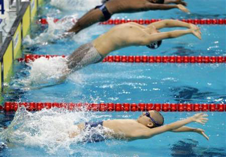 10-year-old swimming boy in Doha