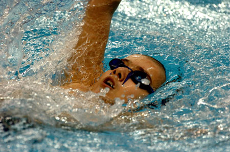 10-year-old swimming boy in Doha