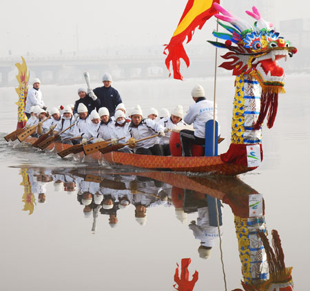 Winter Asiad torch relay on dragon-boat