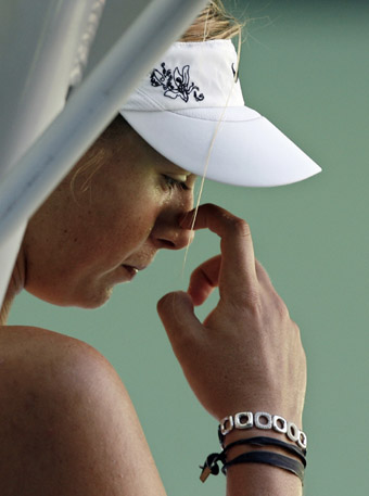 Sharapova sends Clijsters out