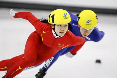 Roses on ice clinces gold in Turin
