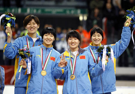 Roses on ice clinces gold in Turin