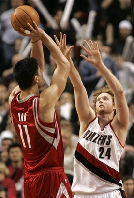 Rockets edge Trail Blazers 99-95 for 50th win