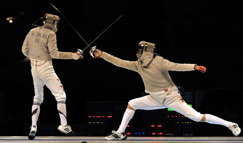 China claims men's sabre team gold with narrow win