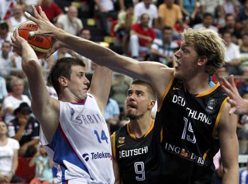 Germany stun Serbia, US march on