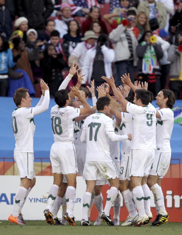 US rallies to draw 2-2 with Slovenia