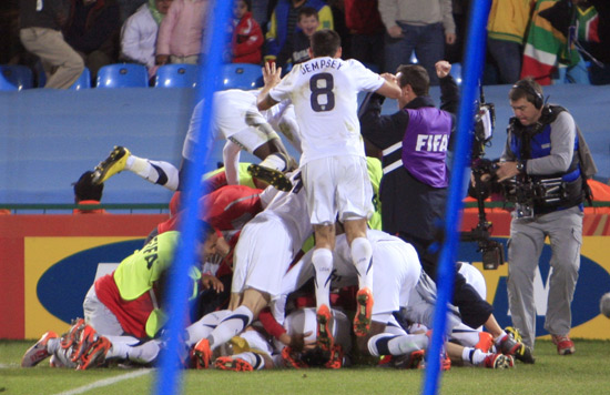 Germany, England through, Ghana survive