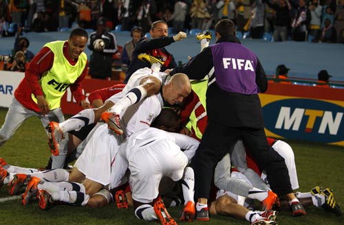 England, US squeeze into second round