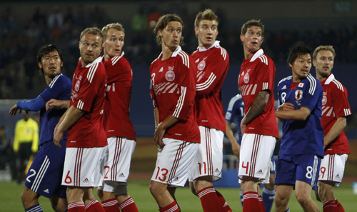 Holders Italy make exit, Japan go through