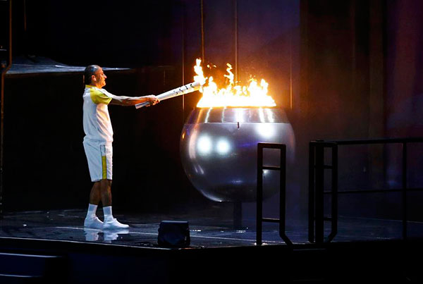 Brazilian marathon runner lights Olympic cauldron