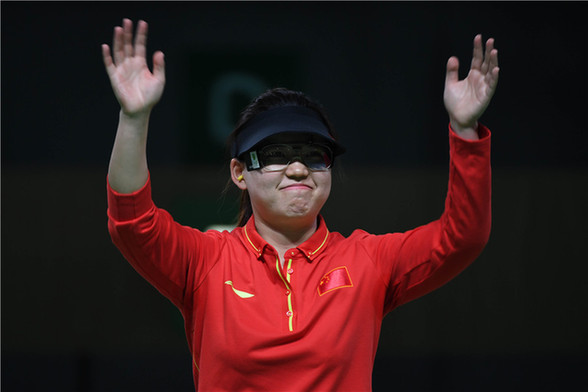 Zhang strikes gold after first-day gloom