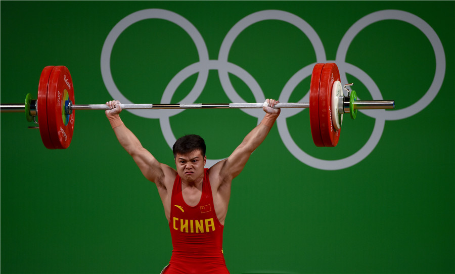 Chinese weightlifter Long smashes world record to win Olympic gold