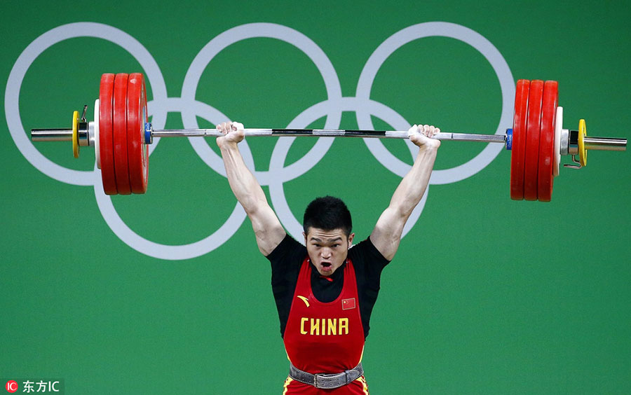 Chinese weightlifter Shi Zhiyong lifts gold