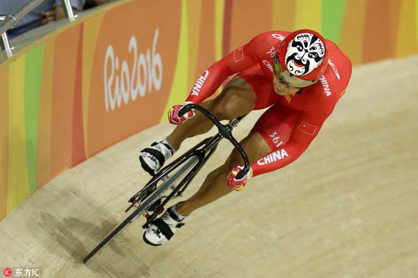 Peking Opera faces spotted on cyclists' helmets in Rio