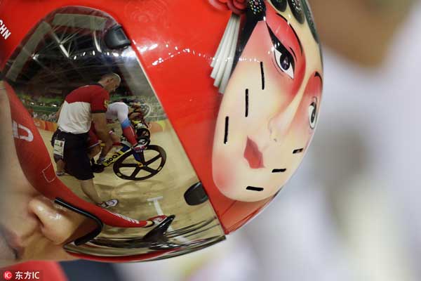 Peking Opera faces spotted on cyclists' helmets in Rio