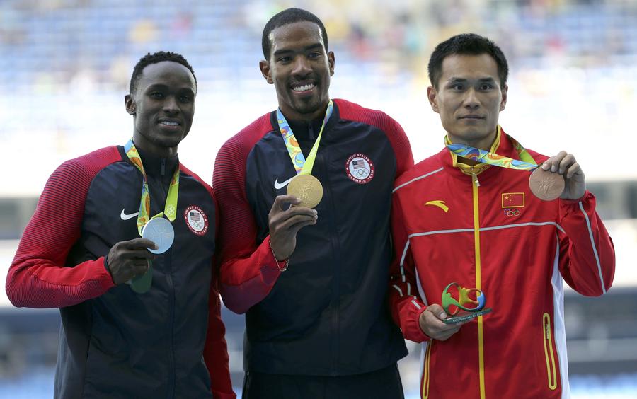 China's Dong Bin wins triple jump bronze