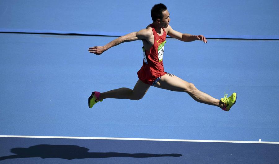 China's Dong Bin wins triple jump bronze