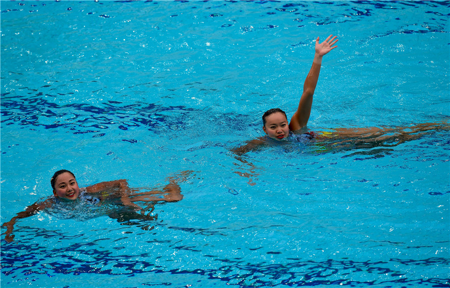 Huang and Sun take synchronized swimming silver