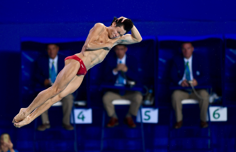 China's Cao Yuan makes up for synchronized loss with individual gold